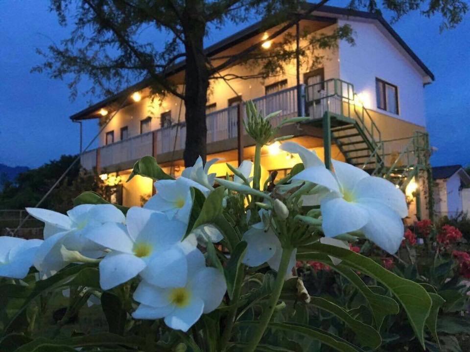 Lei Mi Er Hua Yuan Min Su Apartment Pinghe Exterior photo