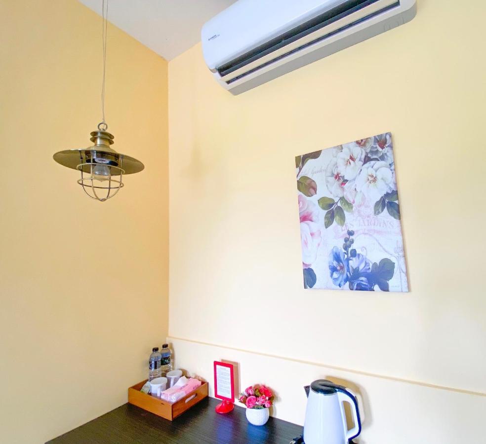 Lei Mi Er Hua Yuan Min Su Apartment Pinghe Exterior photo